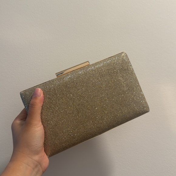 Sondra Robert’s Shimmery gold structured clutch bag - Picture 2 of 3